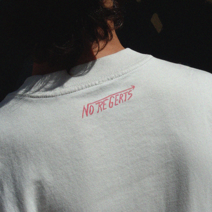 Back print detail of the Oversize fit unisex t-shirt in Bone Color - with naive crayon style Dodge Viper bootleg print in childlike drawing and a tag-style writing saying "No Regerts"